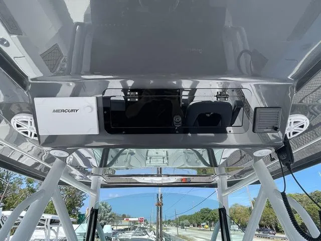 Slide: The Image of 2023 Wellcraft 352 Fisherman boat console with Mercury electronics and speakers. - 21