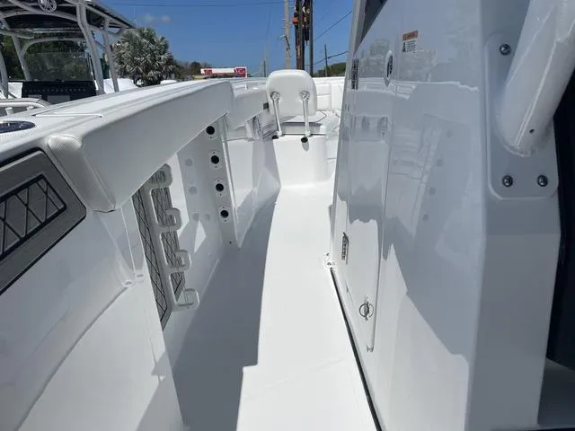 Slide: The Image of 2023 Wellcraft 352 Fisherman boat interior, showcasing sleek white design and modern features. - 22