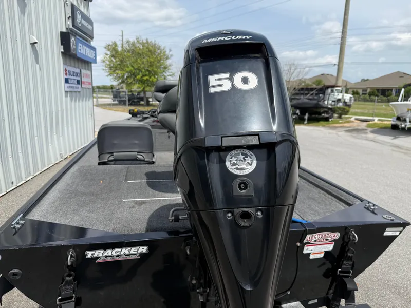 Slide: The Image of 2020 Bass Tracker Classic XL with Mercury 50 engine, parked outdoors. - 11