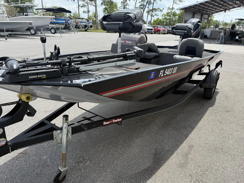 Slide: The Image of 2020 Bass Tracker Classic XL boat on trailer in outdoor setting. - 4