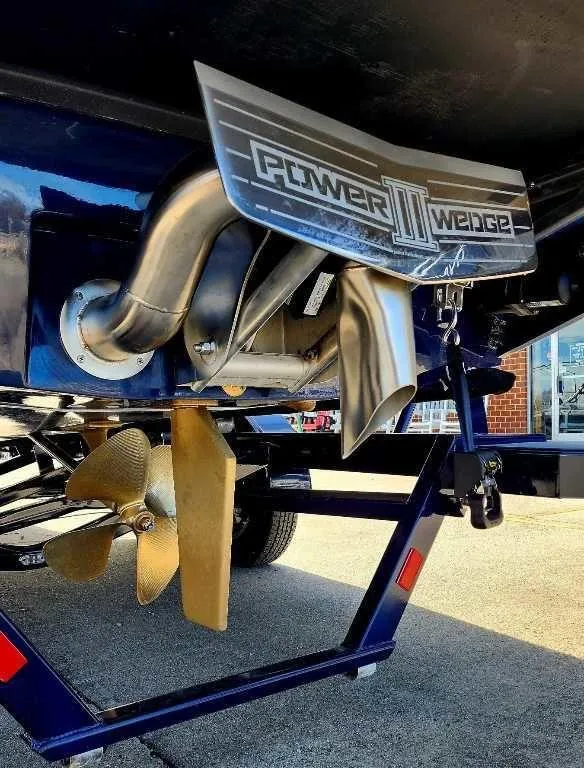 Slide: The Image of 2024 Axis Core Series T235 boat with Power Wedge III and propeller detail. - 6