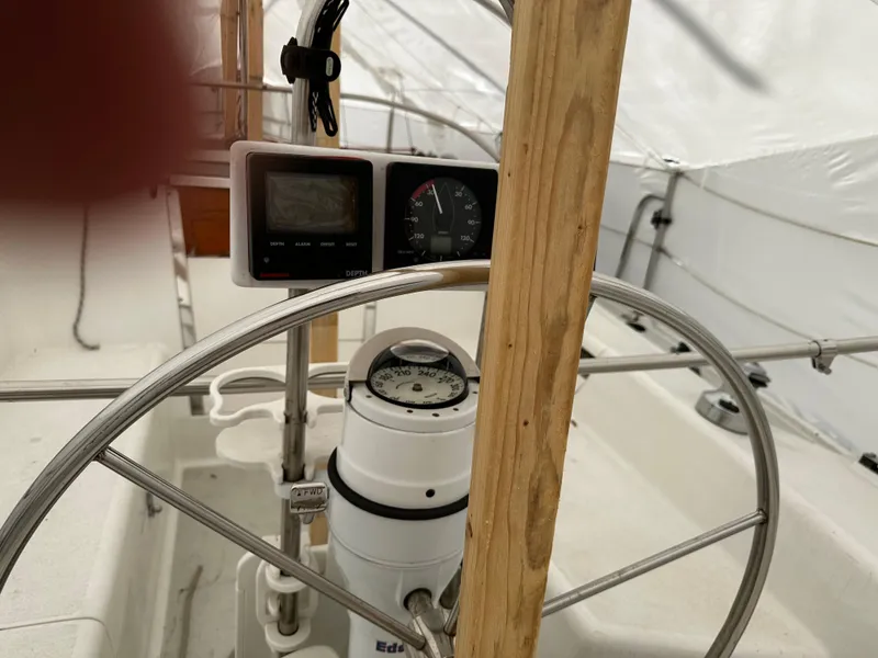 Slide: The Image of Steering wheel and instruments of a 1997 Catalina 28 MkII sailboat. - 11