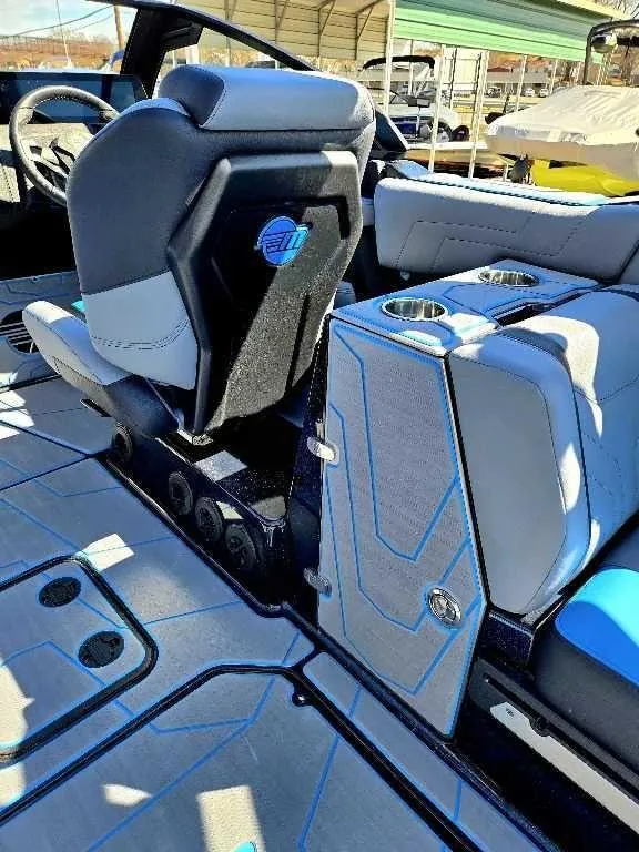 Slide: The Image of 2025 Malibu Wakesetter 25 LSV interior with sleek seating and modern design. - 13