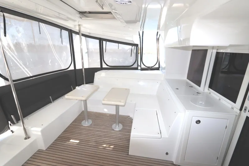 Slide: The Image of Spacious interior of 2017 Lagoon 450 F catamaran with modern seating and sleek design. - 33