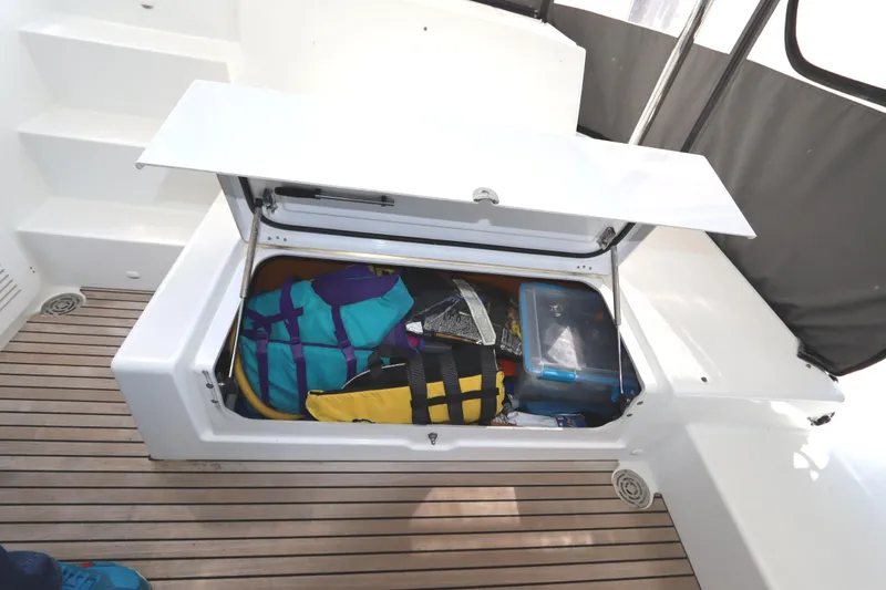 Slide: The Image of Storage compartment on 2017 Lagoon 450 F yacht with bags and gear. - 36