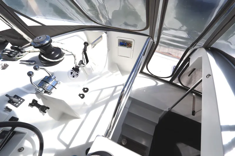 Slide: The Image of Helm station of 2017 Lagoon 450 F catamaran with modern controls and navigation equipment. - 47