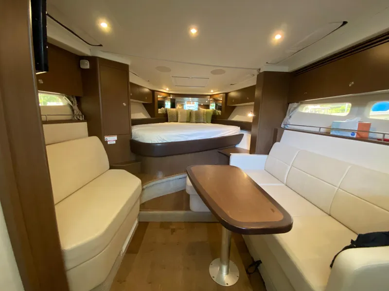 Slide: The Image of Luxurious interior of 2018 Sea Ray Sundancer 350 yacht with seating and bed. - 28