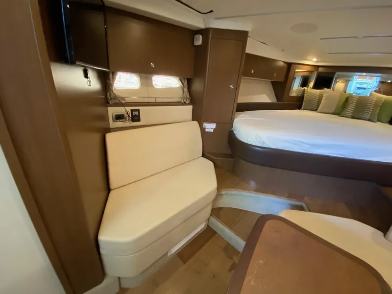 Slide: The Image of Interior of 2018 Sea Ray Sundancer 350 yacht with seating and bed. - 33