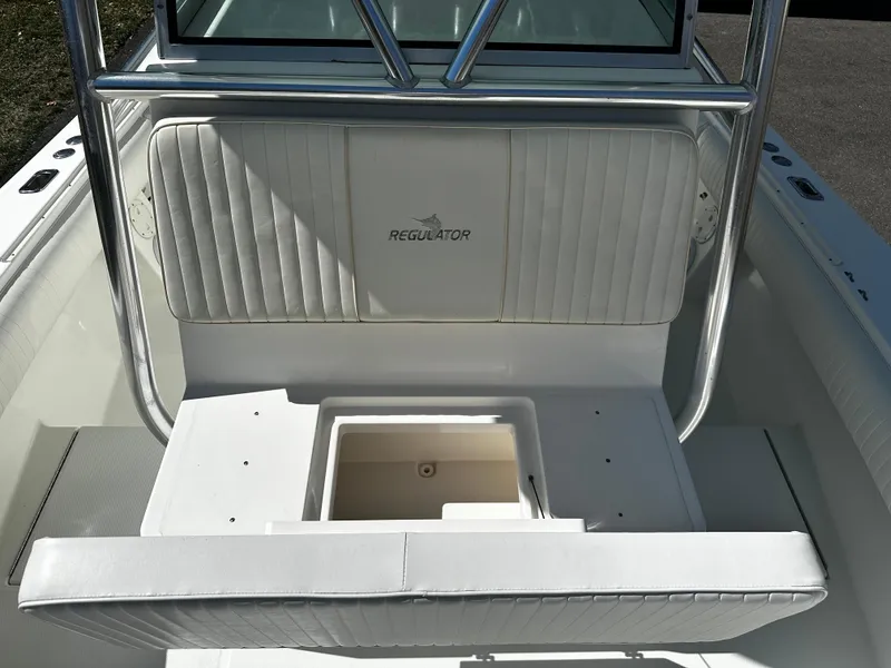 Slide: The Image of 2008 Regulator 29 Forward Seating boat interior with storage compartment. - 10