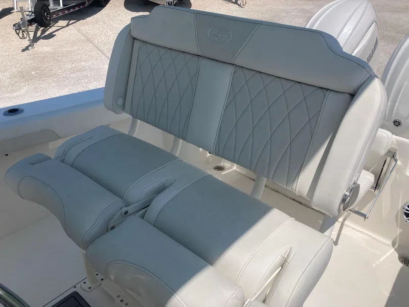 Slide: The Image of 2025 Key West 244CC boat with luxurious white leather seating. - 15