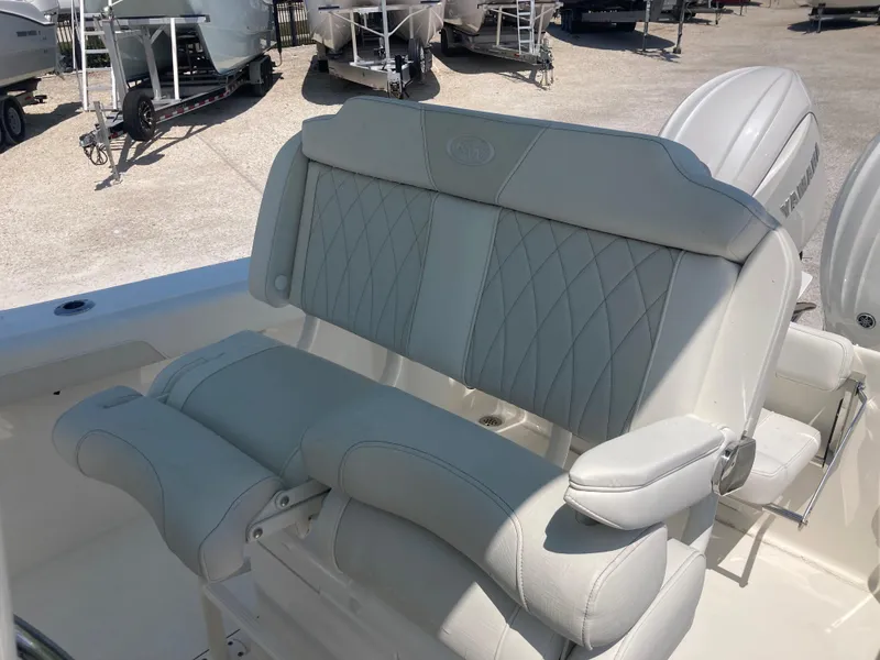 Slide: The Image of 2025 Key West 244CC boat seat with diamond-stitched upholstery, showcasing luxury and comfort. - 16