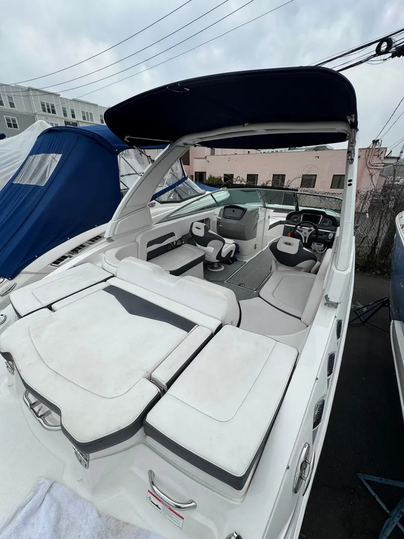 Slide: The Image of 2019 Chaparral 246 SSi boat with spacious seating and sleek design. - 16