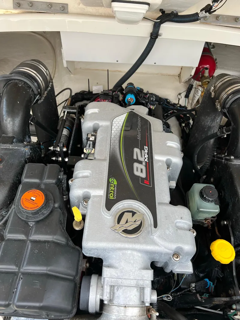 Slide: The Image of 2011 Sea Ray 270 SLX engine, featuring a powerful 8.2L MerCruiser motor. - 38