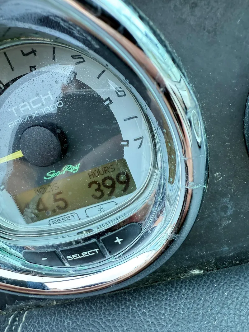 Slide: The Image of Close-up of 2011 Sea Ray 270 SLX tachometer showing 399 hours. - 42