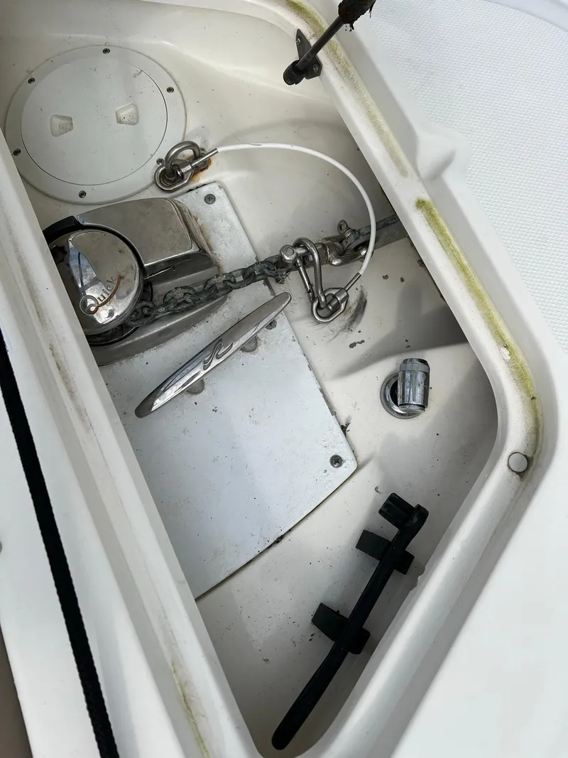 Slide: The Image of Anchor storage compartment on a 2011 Sea Ray 270 SLX boat. - 8