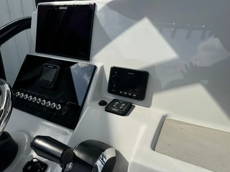 Slide: The Image of 2024 Sea Pro 248 boat dashboard with modern navigation and control systems. - 20