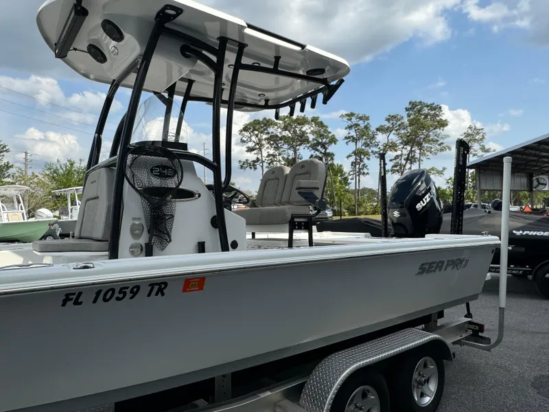 Slide: The Image of 2024 Sea Pro 248 boat on trailer, featuring a sleek design and modern equipment. - 5