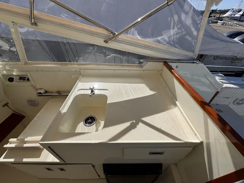 Slide: The Image of 1977 Bertram 28 Moppie boat interior with sink and counter space. - 20