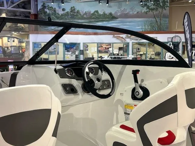 Slide: The Image of Interior view of 2025 Tahoe 200 S boat with modern dashboard and seating. - 5