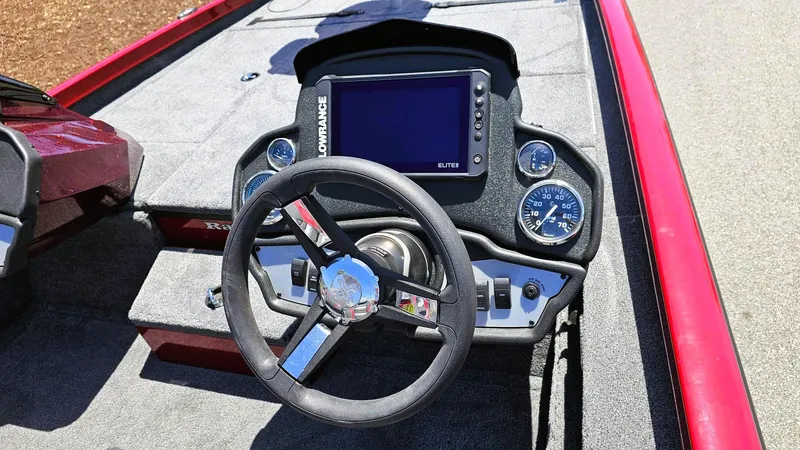 Slide: The Image of 2025 Ranger RT188P boat dashboard with steering wheel and electronic display. - 6