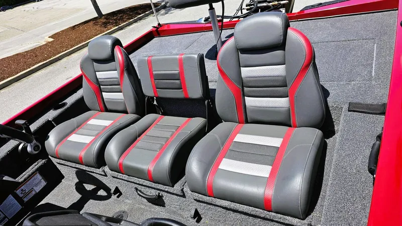 Slide: The Image of 2025 Ranger RT188P boat seats with gray and red upholstery, showcasing modern design and comfort. - 8