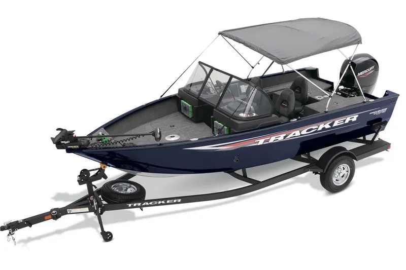 Slide: The Image of 2025 Tracker Pro Guide V-175 Combo boat interior with seating and steering console. - 4