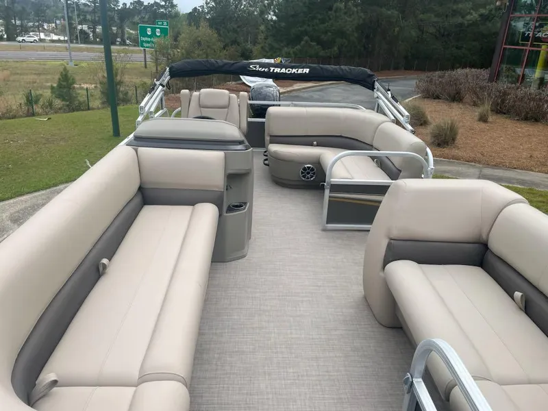 Slide: The Image of 2025 Sun Tracker Party Barge 18 DLX pontoon boat with spacious seating and modern design. - 3