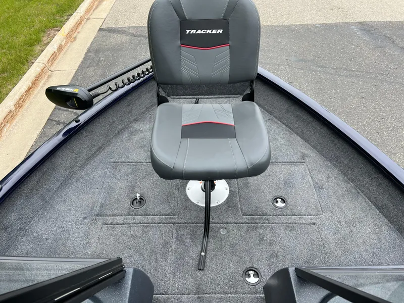Slide: The Image of 2025 Tracker Pro Guide V-16 WT boat with swivel seat and carpeted deck. - 5