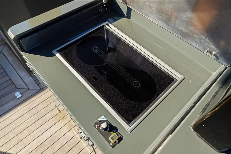 Slide: The Image of Built-in stove on 2011 Fjord 40 Open yacht, featuring sleek design and modern controls. - 14