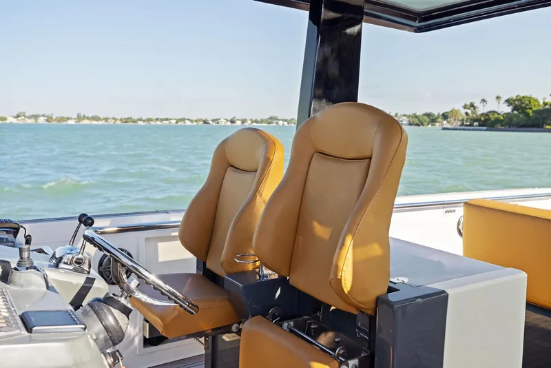 Slide: The Image of Luxury seating on 2011 Fjord 40 Open yacht with ocean view. - 27