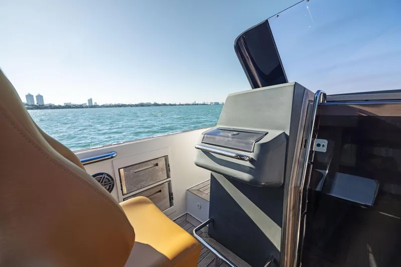 Slide: The Image of 2011 Fjord 40 Open boat interior with ocean view and modern dashboard. - 29