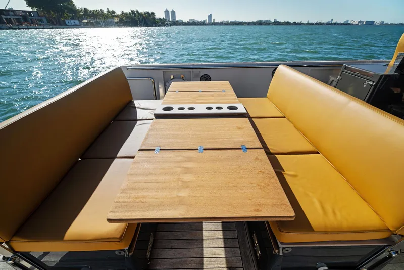 Slide: The Image of Luxury seating area on 2011 Fjord 40 Open yacht with ocean view. - 34