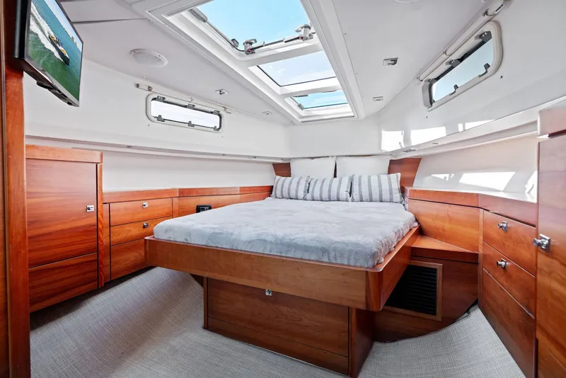 Slide: The Image of Luxurious cabin interior of 2011 Fjord 40 Open yacht with skylights and wooden furnishings. - 9