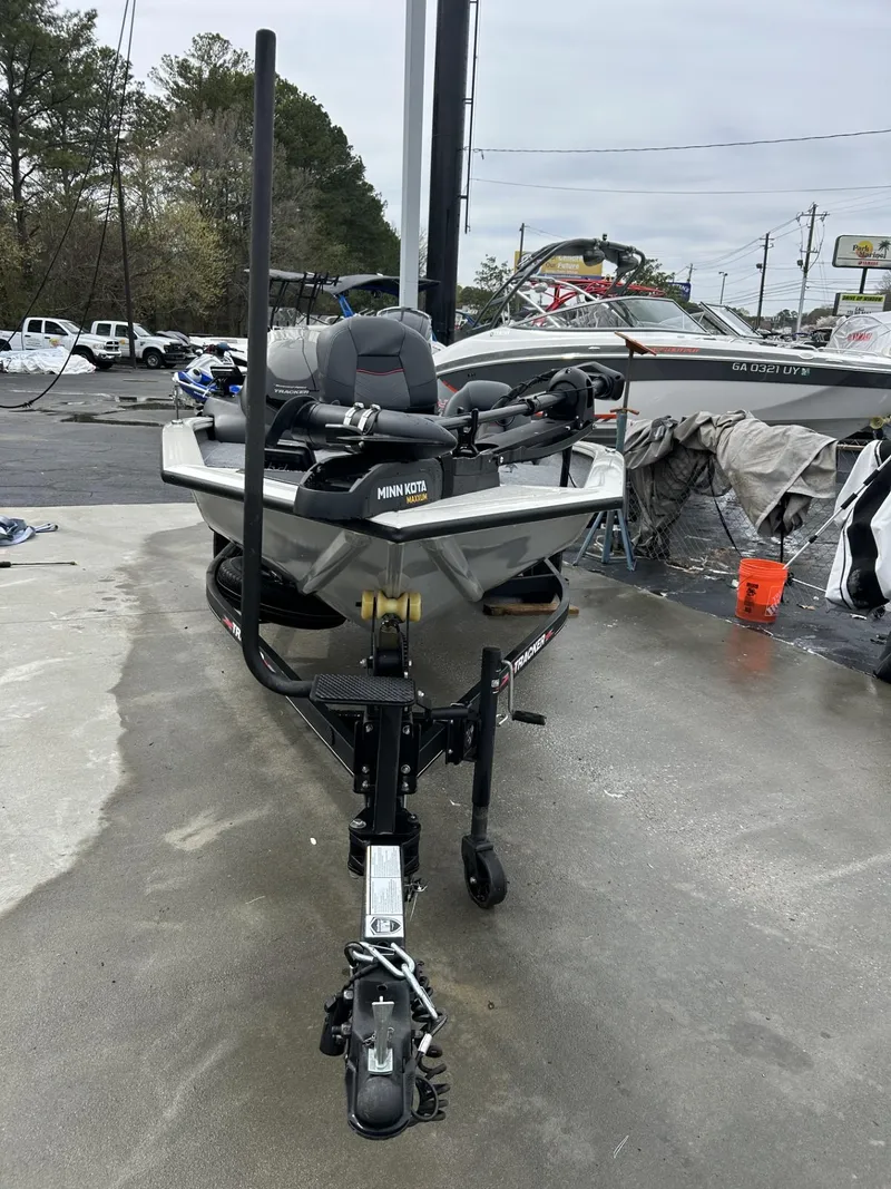 Slide: The Image of 2022 Bass Tracker PRO TEAM 175 TXW TOURNAMENT EDITION boat on trailer in outdoor setting. - 11