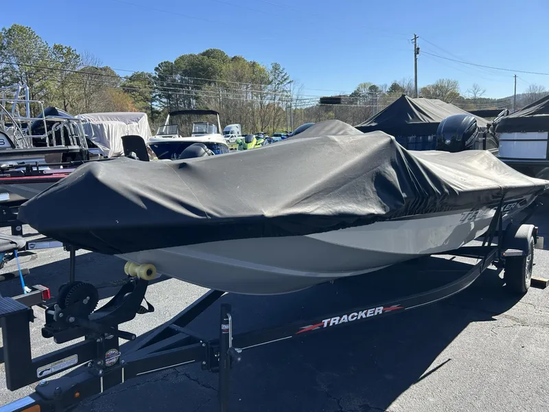 Slide: The Image of 2022 Bass Tracker PRO TEAM 175 TXW TOURNAMENT EDITION boat covered on trailer. - 15