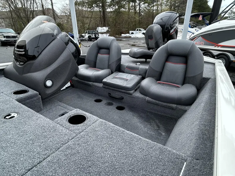 Slide: The Image of 2022 Bass Tracker PRO TEAM 175 TXW TOURNAMENT EDITION boat interior with seating and motor. - 8