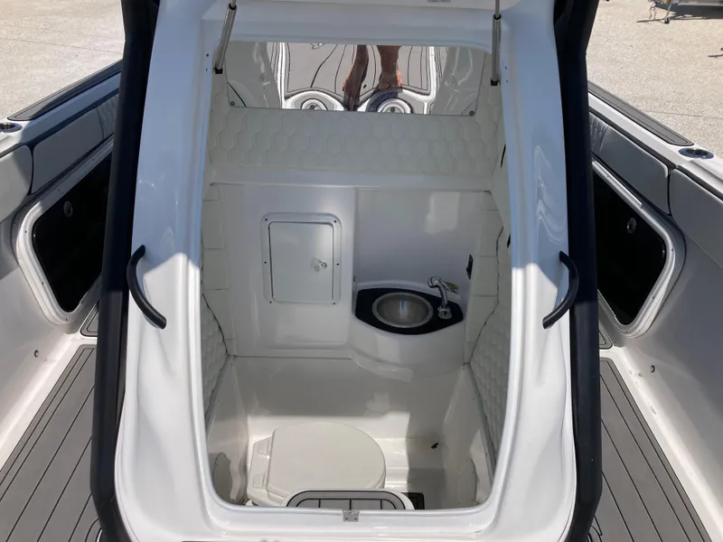 Slide: The Image of 2022 Glasstream 36 PRO boat interior with sink and storage compartment. - 12