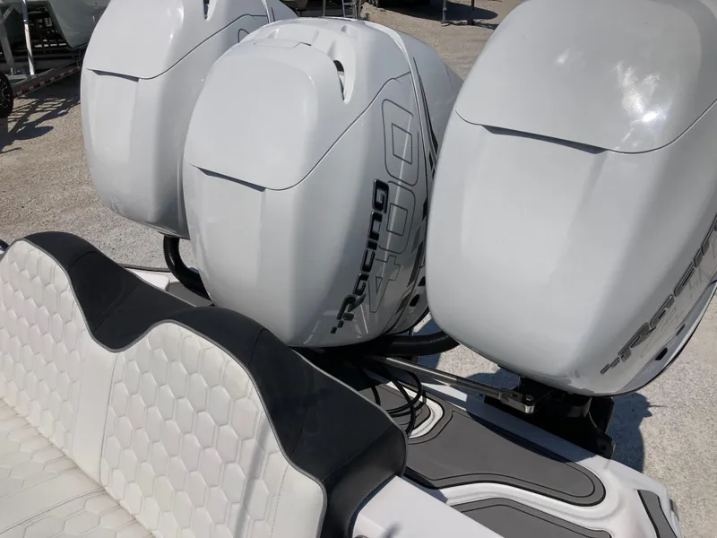 Slide: The Image of 2022 Glasstream 36 PRO boat with triple outboard engines and stylish seating. - 15