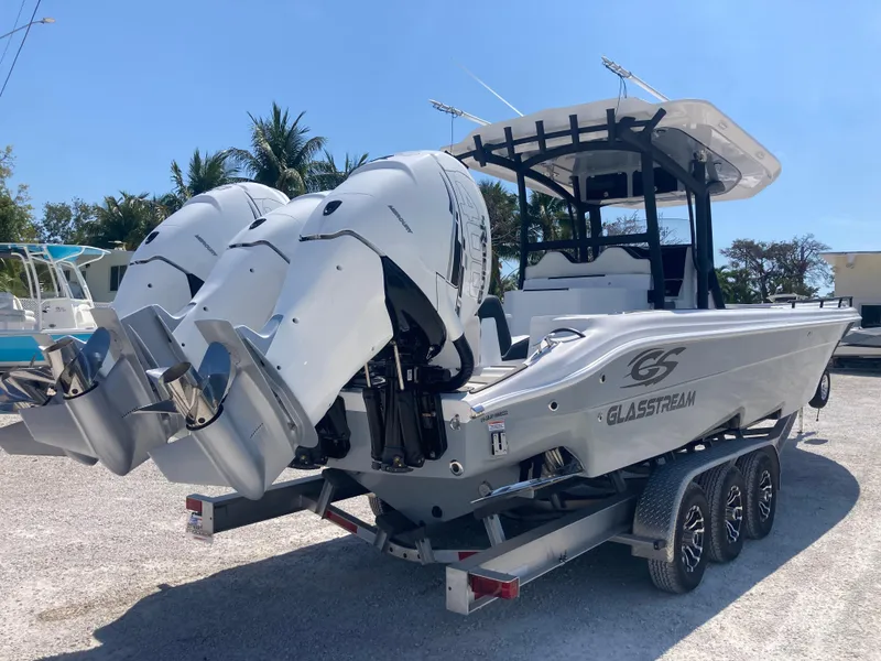 Slide: The Image of 2022 Glasstream 36 PRO boat with triple outboard engines on a trailer. - 3
