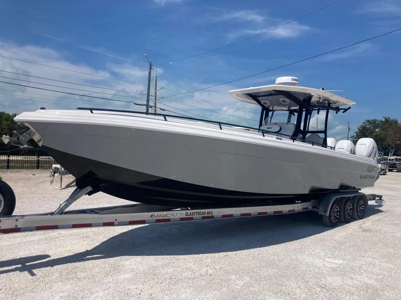 Slide: The Image of 2022 Glasstream 36 PRO boat on trailer under clear blue sky. - 5