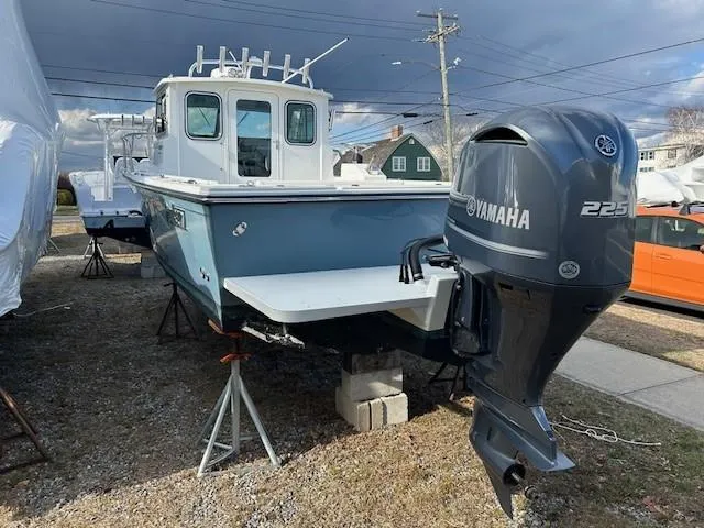 Slide: The Image of 2020 Parker 2320 SL Sport Cabin boat with Yamaha 225 engine on display. - 17