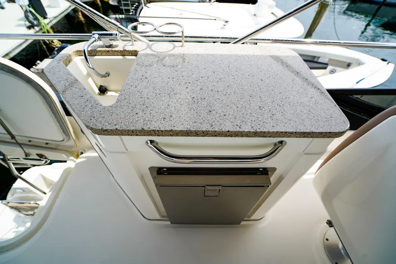 Slide: The Image of Outdoor kitchenette on 2016 Sea Ray 400 Fly yacht with sink and countertop. - 15