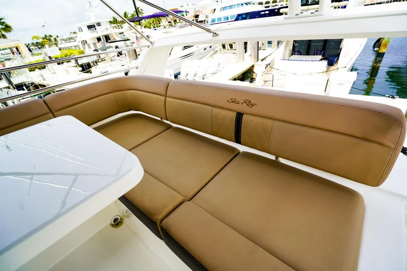 Slide: The Image of Luxurious seating on 2016 Sea Ray 400 Fly yacht, docked at marina. - 18