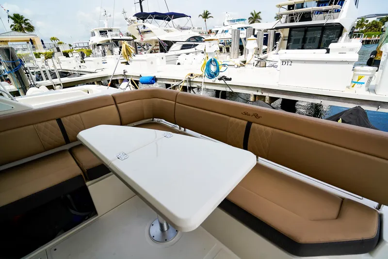 Slide: The Image of Luxurious seating area on a 2016 Sea Ray 400 Fly yacht at a marina. - 20