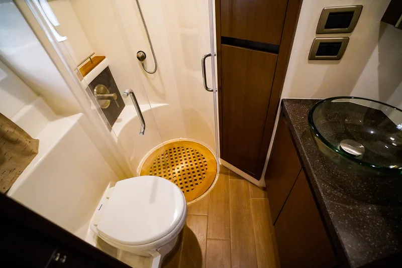 Slide: The Image of Bathroom interior of 2016 Sea Ray 400 Fly yacht with shower and modern fixtures. - 39