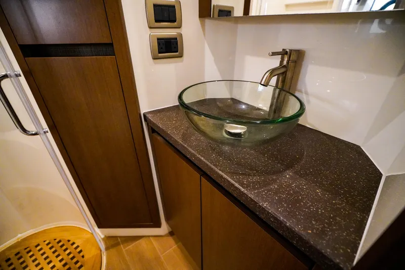 Slide: The Image of Luxurious bathroom sink area in 2016 Sea Ray 400 Fly yacht. - 40