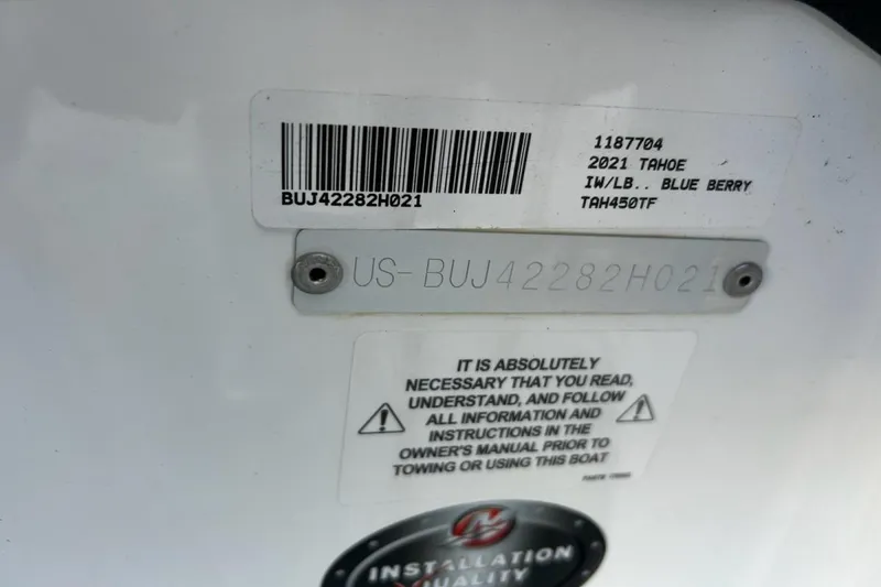 Slide: The Image of 2021 Tahoe 450 TF boat identification plate with serial number and instructions. - 4
