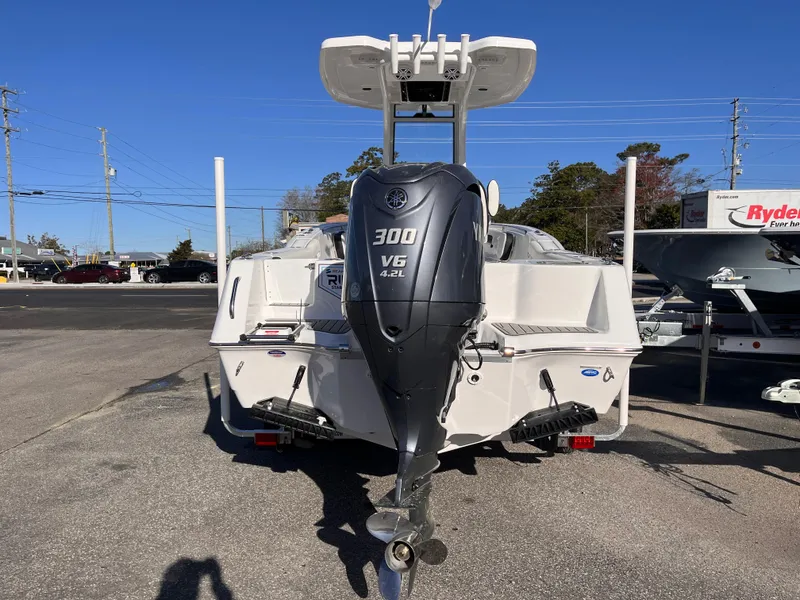 Slide: The Image of 2025 Tidewater 232 CC Adventure boat with powerful 300 V6 engine, rear view. - 3