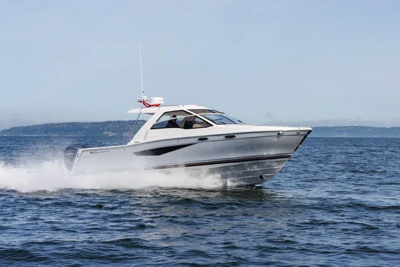 The Image of 2026 Solara S 310 Sport Coupe cruising on open water. - 0