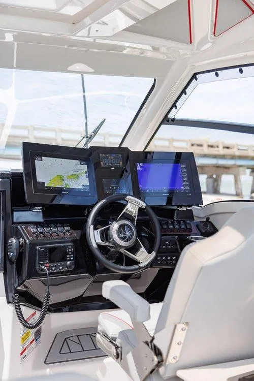 Slide: The Image of Interior of 2026 Solara S 310 Sport Coupe with advanced navigation system and sleek steering wheel. - 3